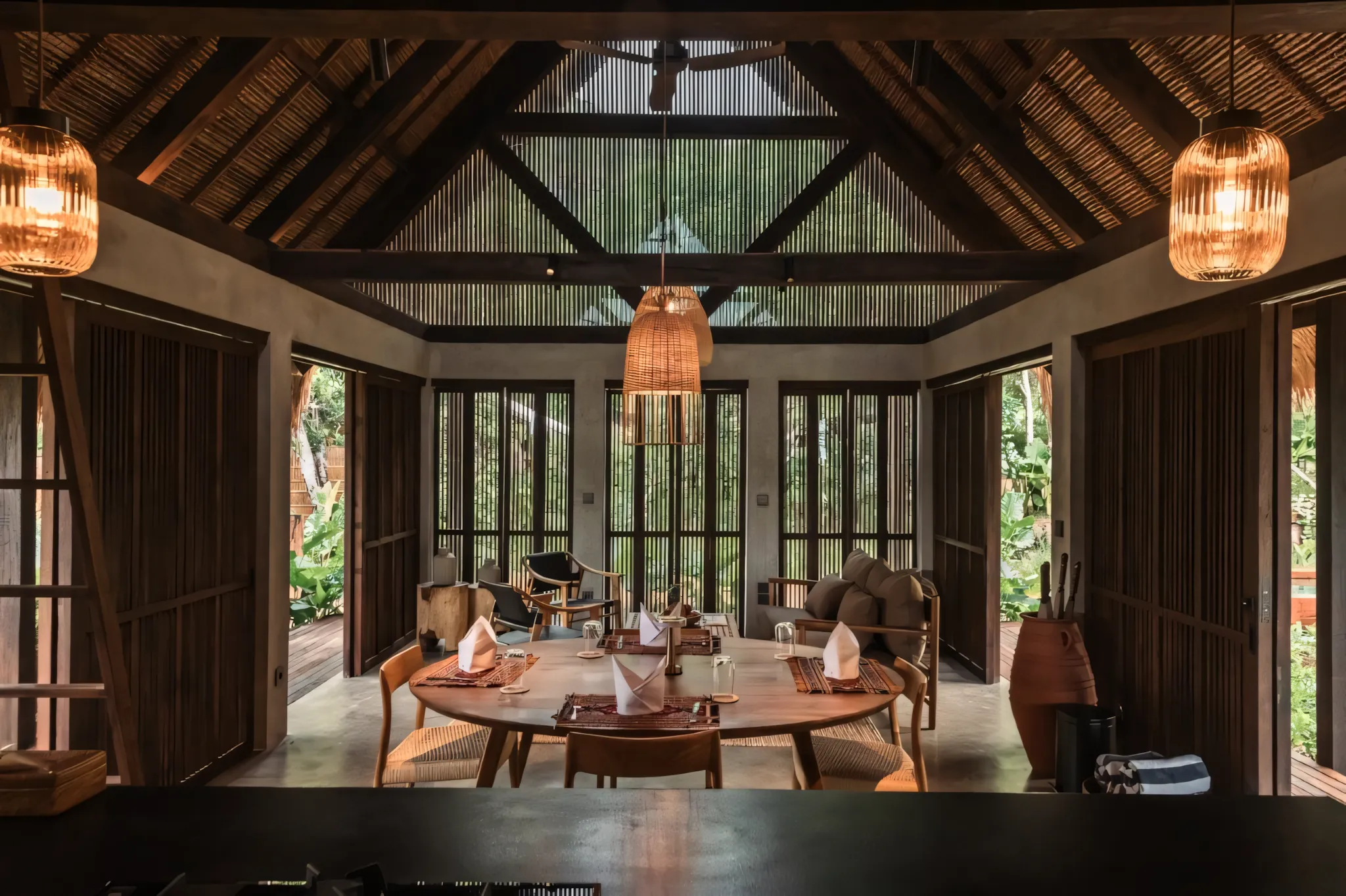 Timber-and-thatch hall at Tampah Hills, Lombok.