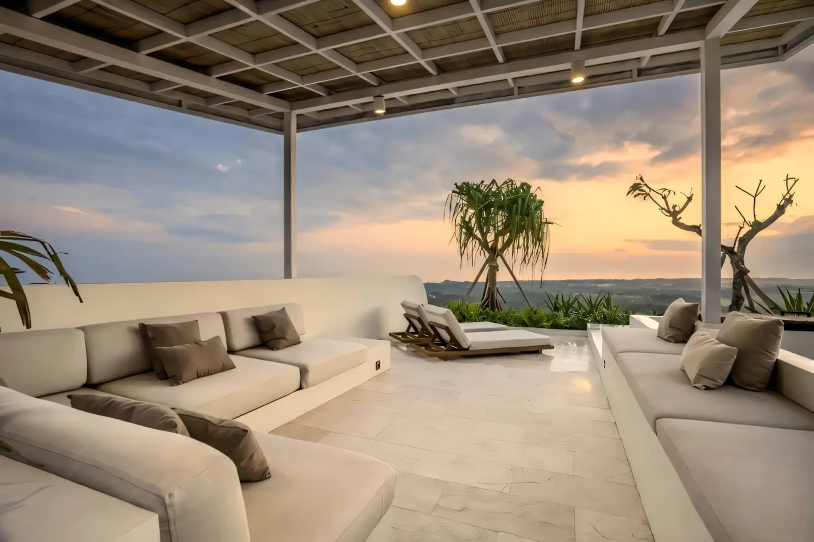 Sunset terrace with a sunken lounge at Kalani Villa, Uluwatu.